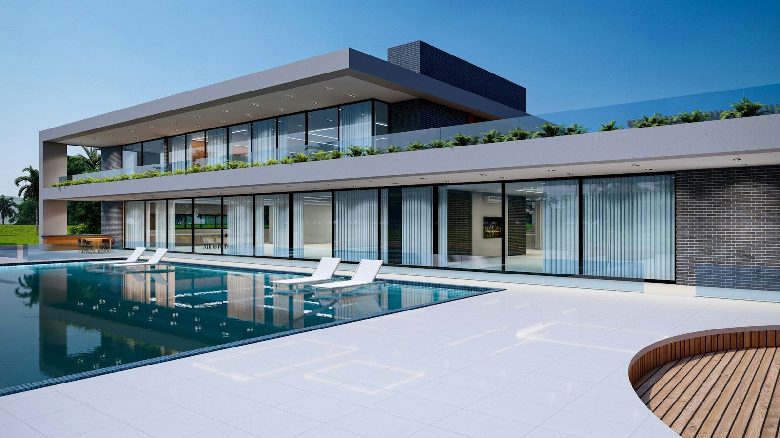 Long pool and terrace of a modern two-storey home